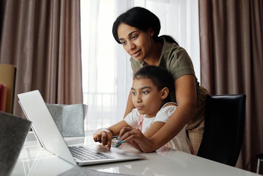 Happy student studying with parent