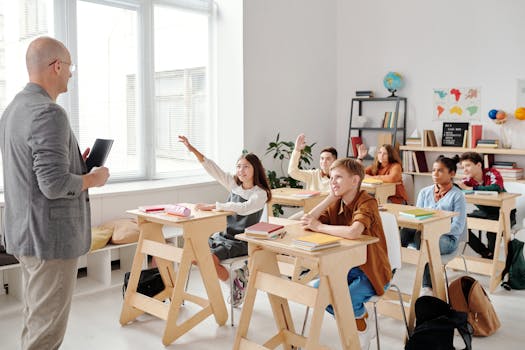 a teacher providing feedback to students