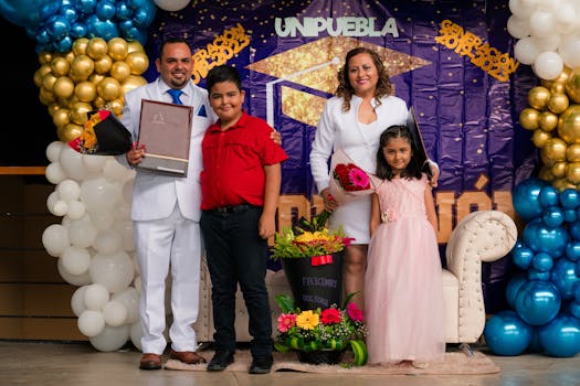 A parent and child celebrating academic success