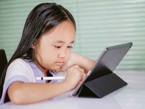 student using a study app on a tablet