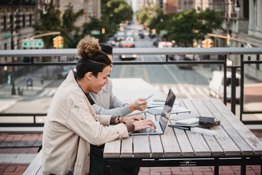 happy student studying together online