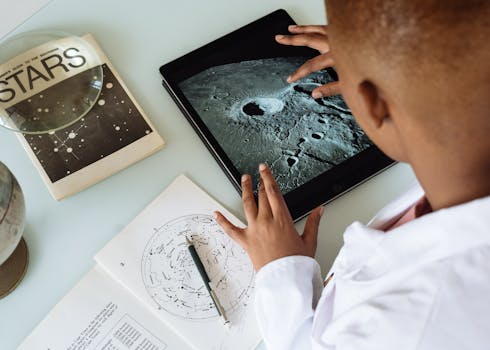 A child studying with a reward chart