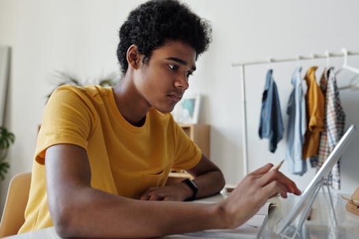 child using educational app on tablet