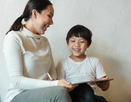 child using a study app on tablet