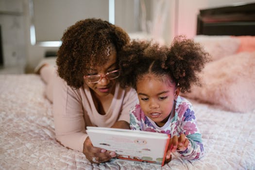 A parent and child discussing a book